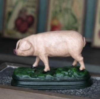 Cast Iron Pig on Grass