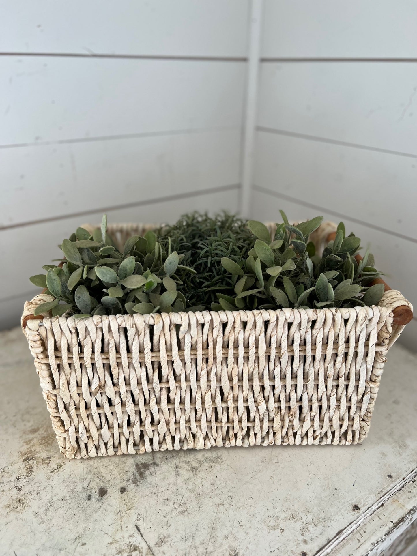Light woven basket with wood handles